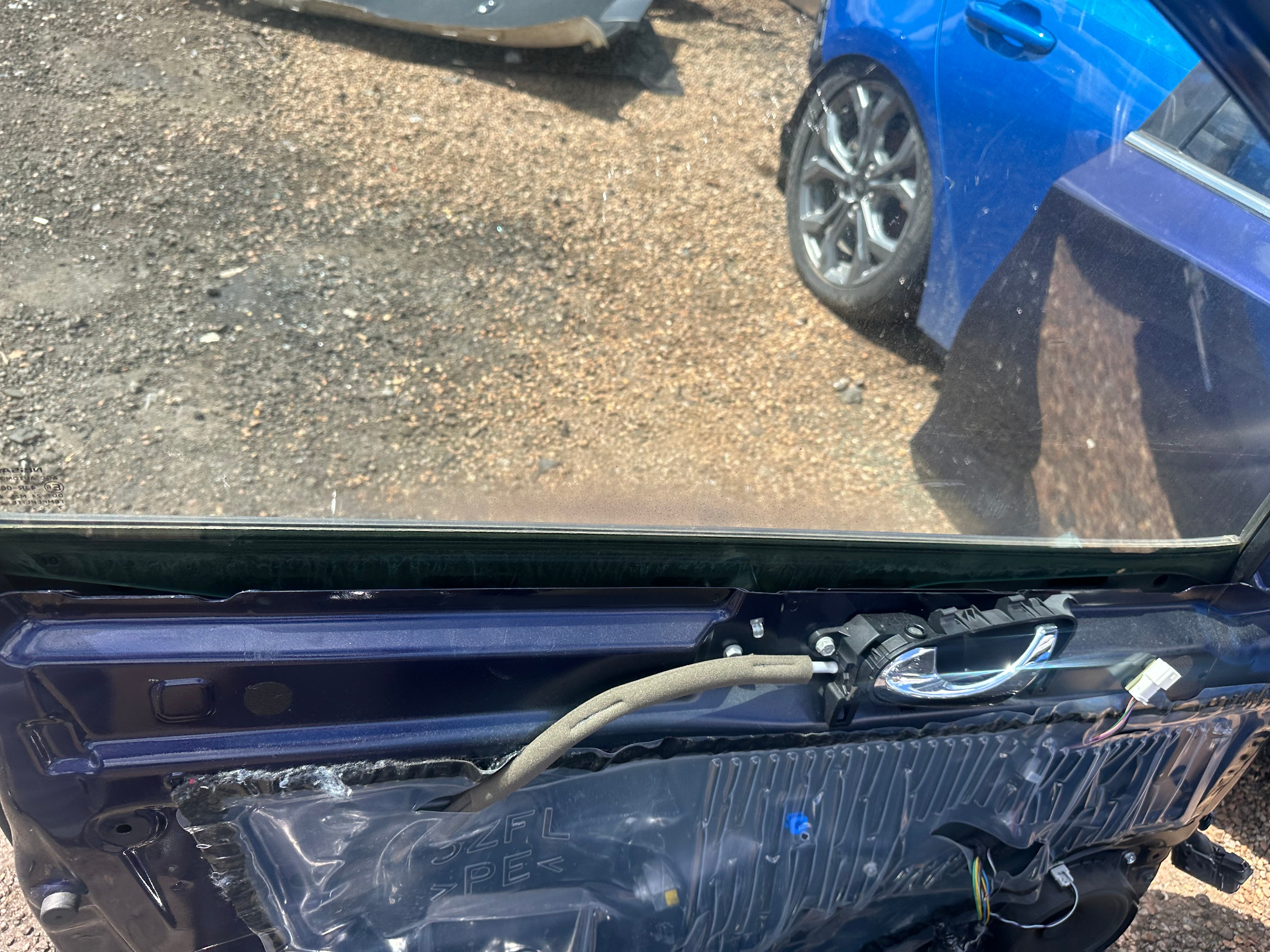 Nissan Pulsar 2014–2018 N/S/F Left Front Door – Colour Code: RBR (Blue)