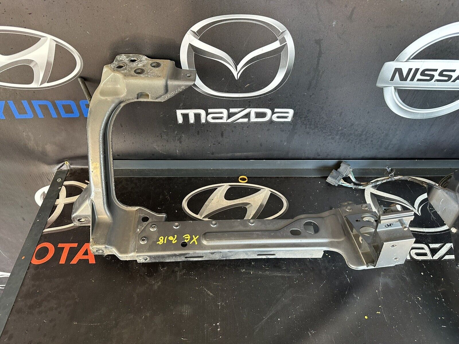 Jaguar XE X760  Front Left Passenger Side Headlight Bracket GX7313N079A 2015-24