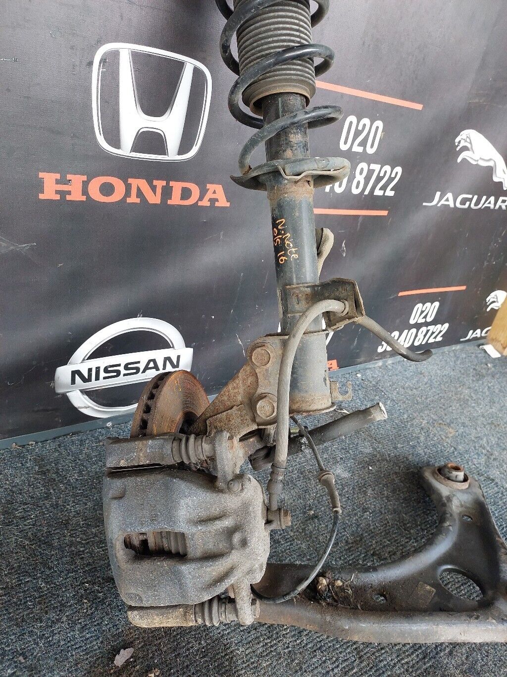 NISSAN NOTE 2016 O/S FRONT SUSPENSION LEG COMPLETE RH