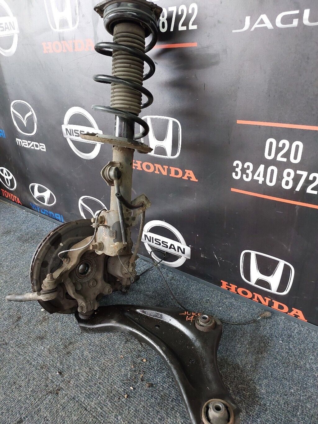 NISSAN JUKE N/S FRONT COMPLETE SUSPENSION LEG LH 2014