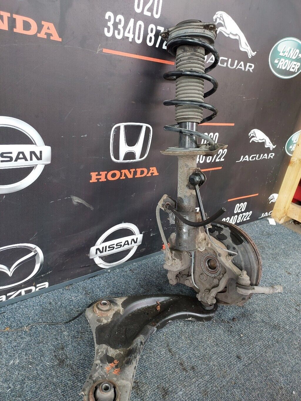 NISSAN JUKE O/S FRONT COMPLETE SUSPENSION LEG RH 2014