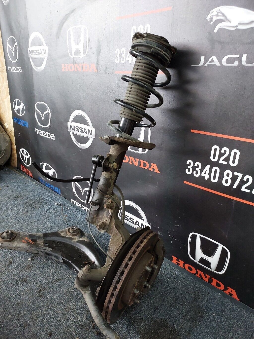 NISSAN JUKE O/S FRONT COMPLETE SUSPENSION LEG RH 2014