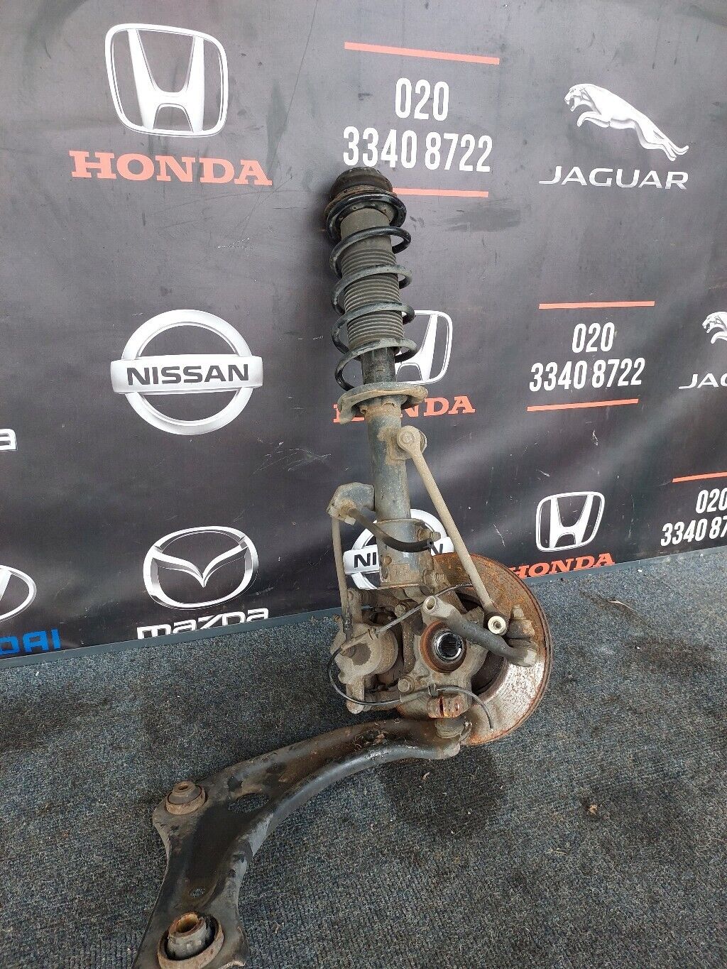 NISSAN NOTE 2016 O/S FRONT SUSPENSION LEG COMPLETE RH