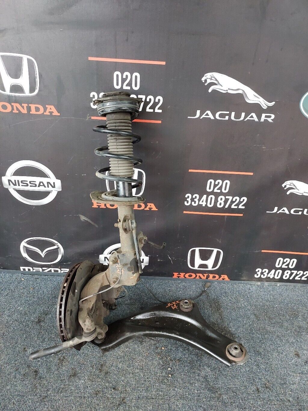 NISSAN JUKE N/S FRONT COMPLETE SUSPENSION LEG LH 2014
