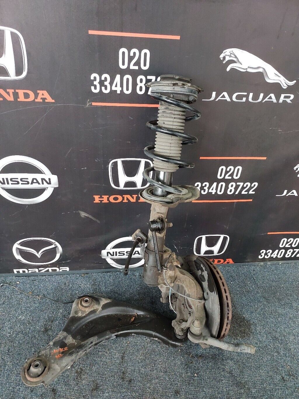 NISSAN JUKE O/S FRONT COMPLETE SUSPENSION LEG RH 2014
