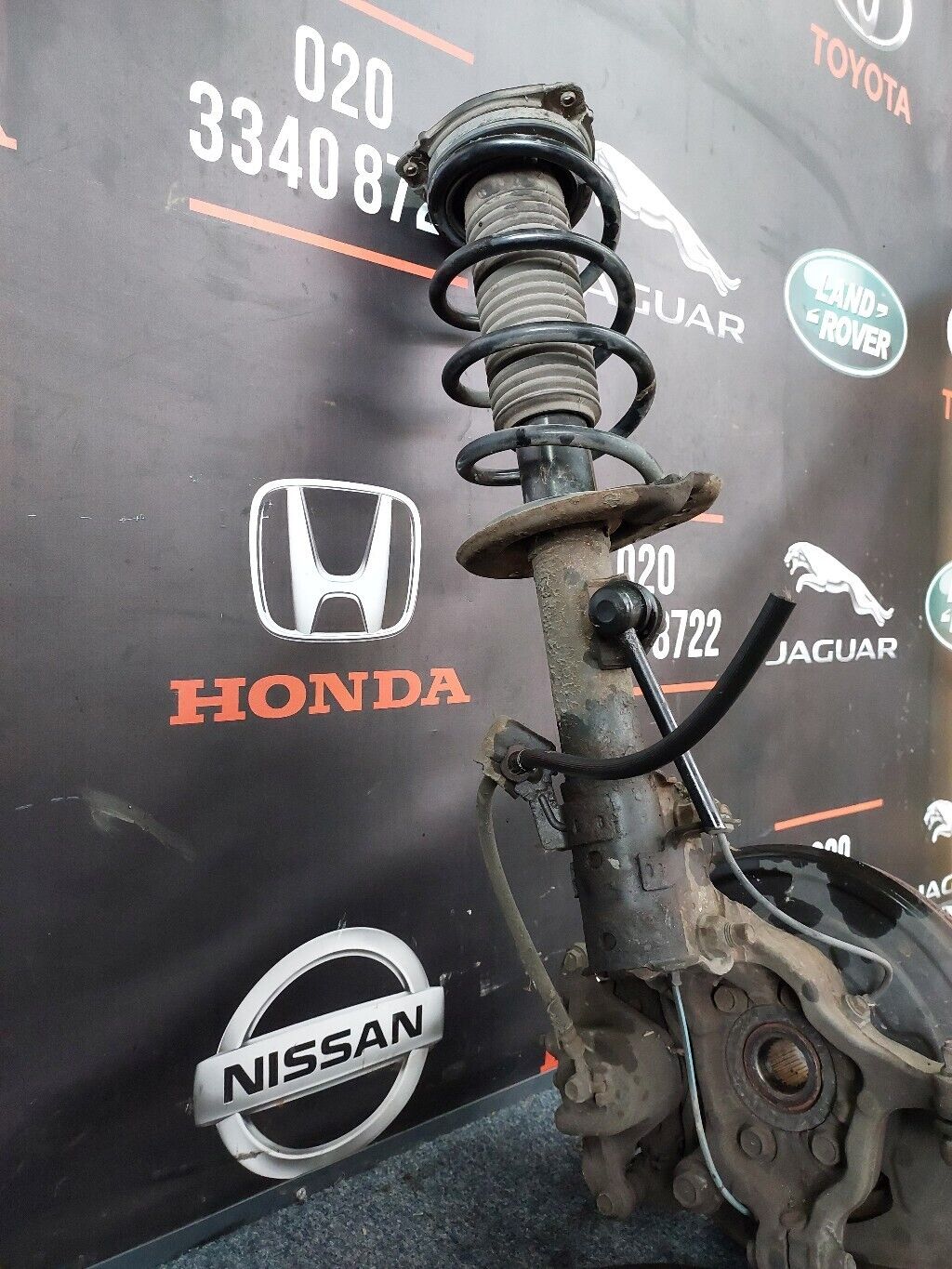 NISSAN JUKE O/S FRONT COMPLETE SUSPENSION LEG RH 2014
