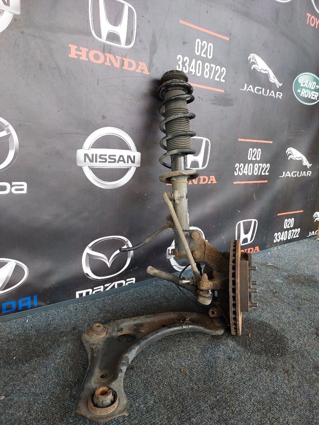 NISSAN NOTE 2016 O/S FRONT SUSPENSION LEG COMPLETE RH